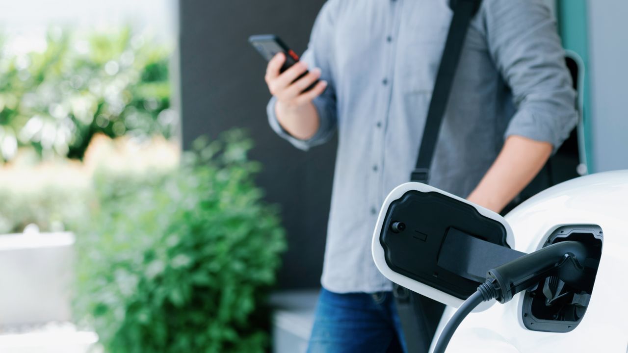 "Optimizing EV Charging Station Management: Scalability and Security"